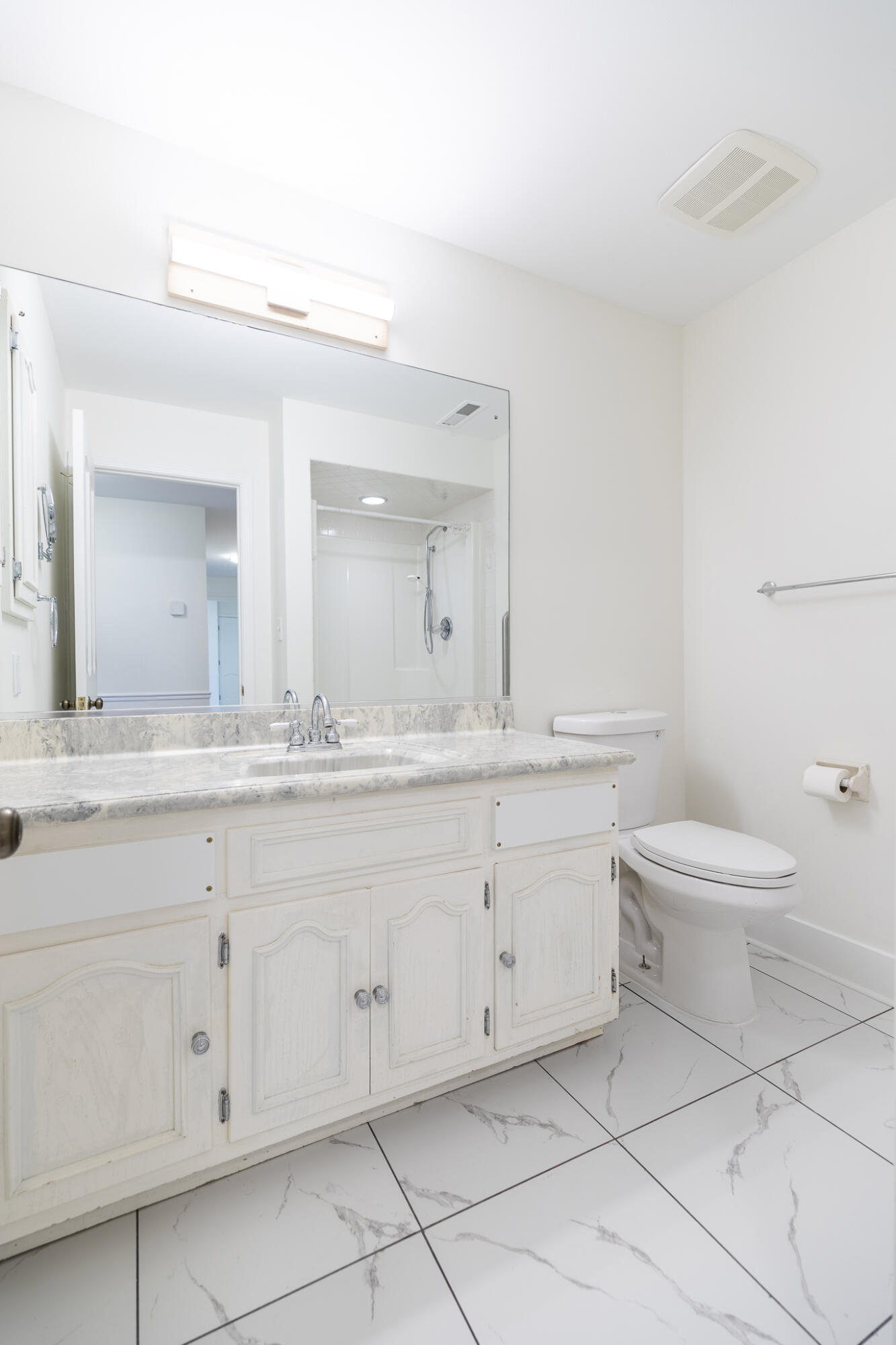 2255 Bordeaux, Unit B1 Highland, IN 46322 - Photo 46 of 49 a bathroom with a granite countertop toilet sink and mirror