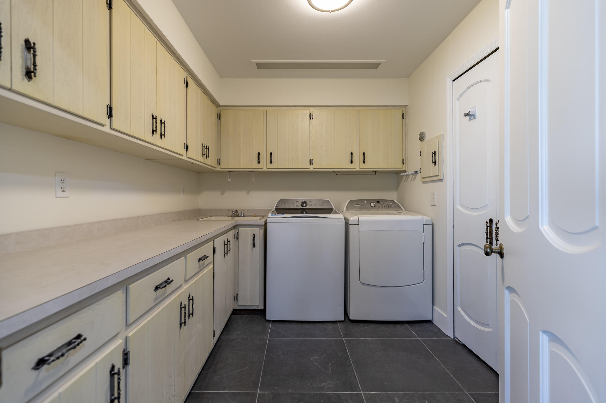 2255 Bordeaux, Unit B1 Highland, IN 46322 - Photo 47 of 49 a utility room with cabinets washer and dryer