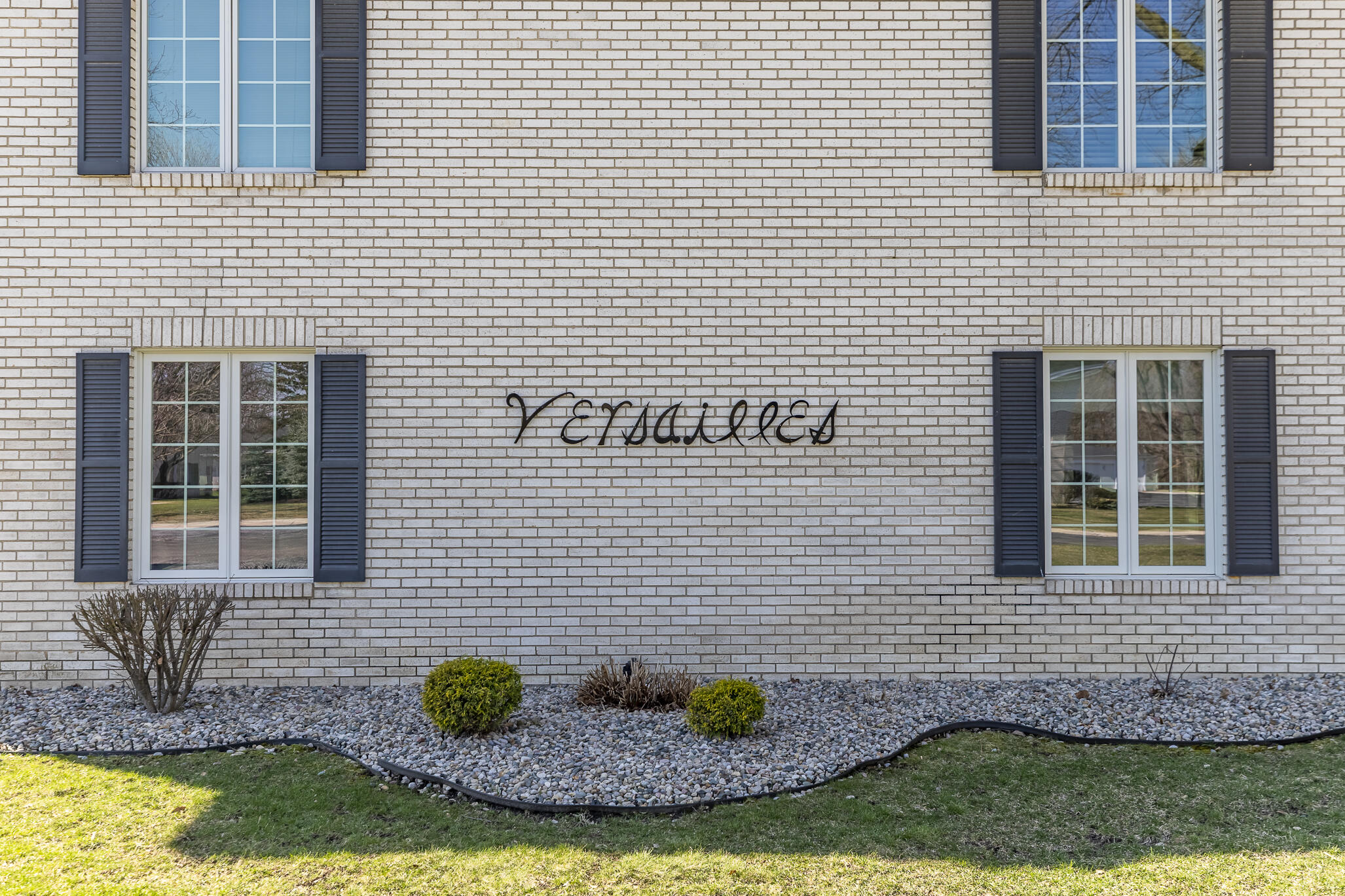 2255 Bordeaux, Unit B1 Highland, IN 46322 - Photo 48 of 49 a view of brick house with a yard