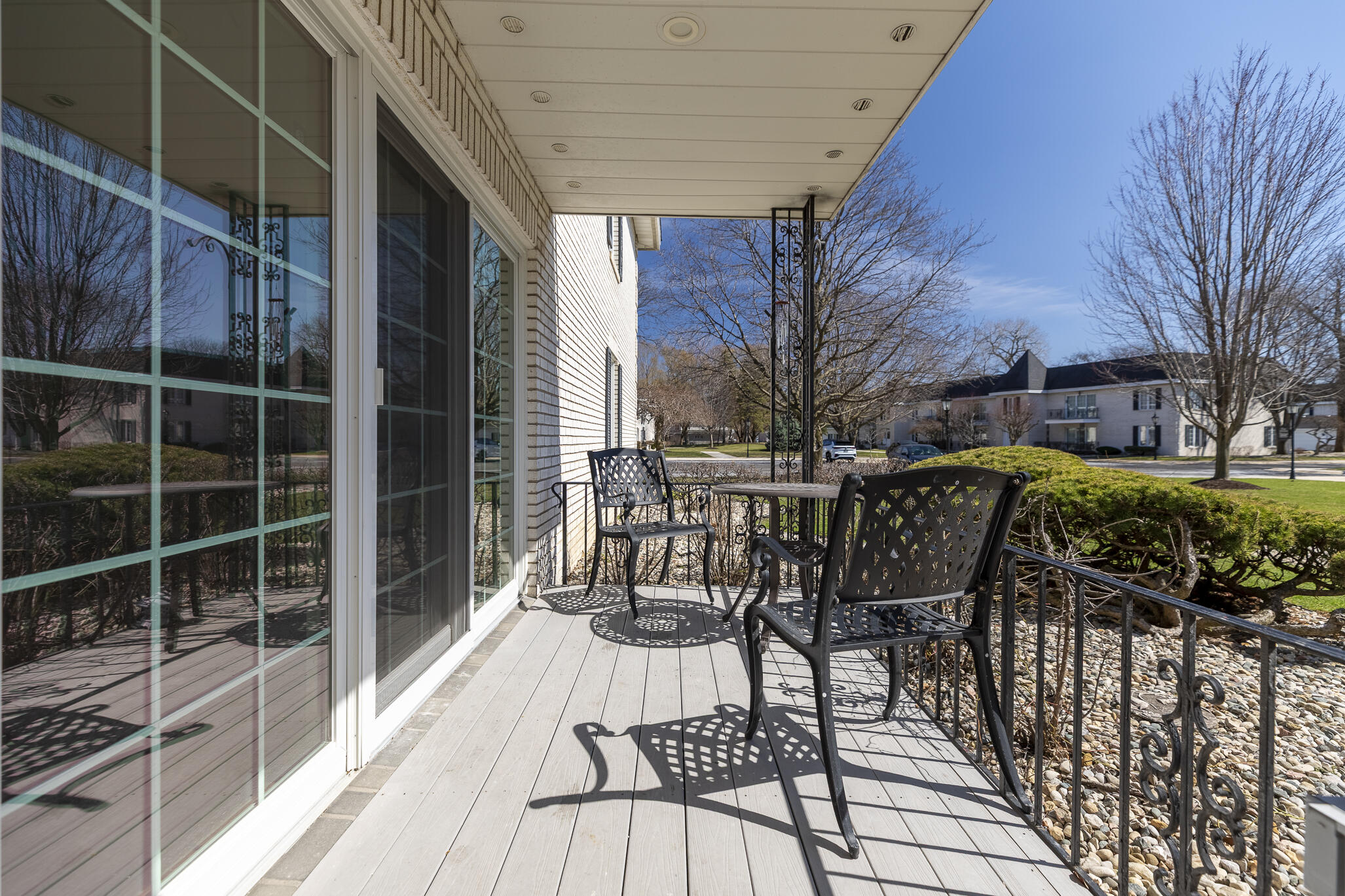2255 Bordeaux, Unit B1 Highland, IN 46322 - Photo 5 of 49 a view of a chairs and table in the balcony