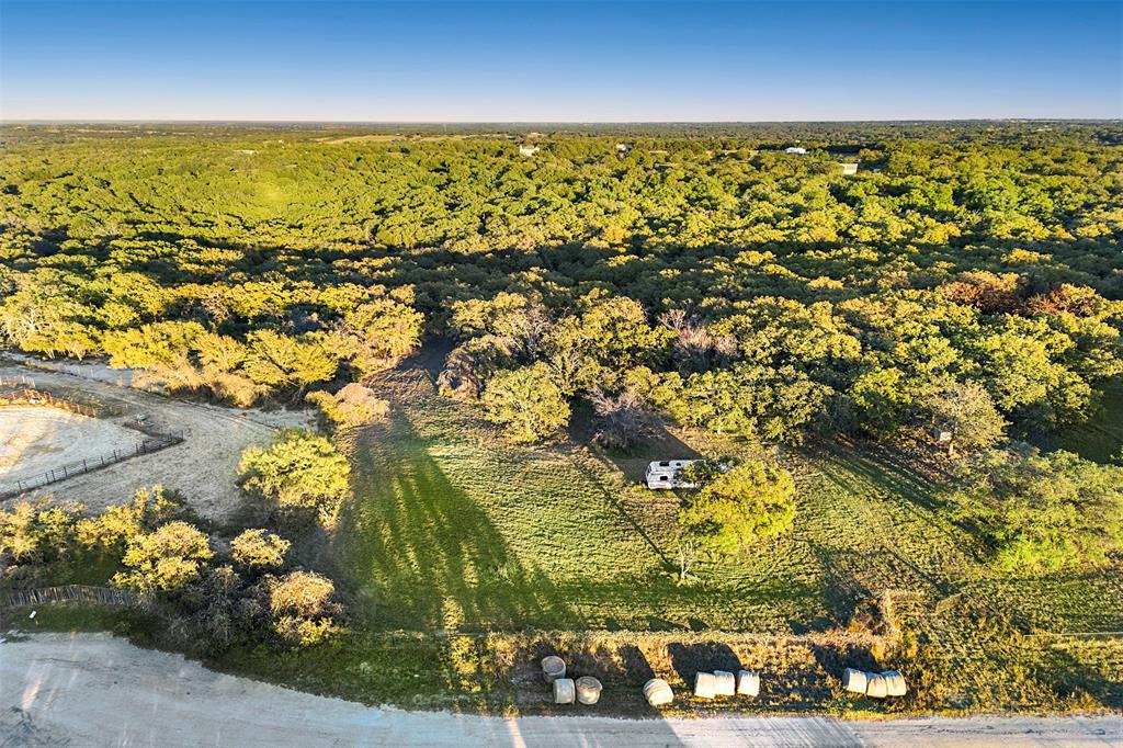 204 North Cheyenne Springtown, TX 76082 - Photo 5 of 12 an aerial view of residential houses with outdoor space