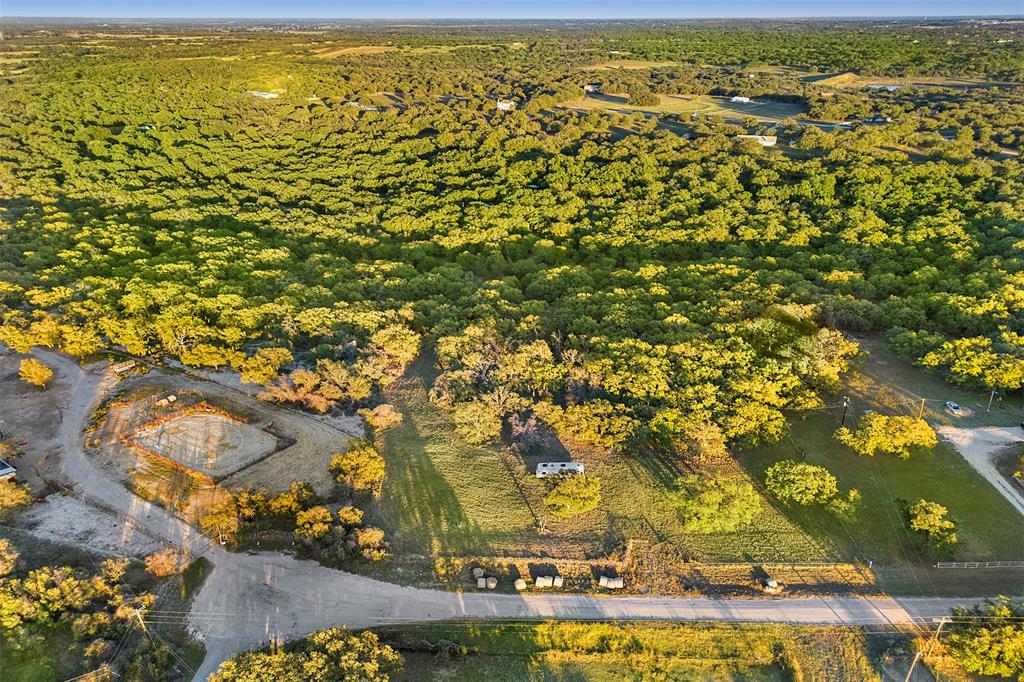 204 North Cheyenne Springtown, TX 76082 - Photo 6 of 12 an aerial view of residential houses with outdoor space