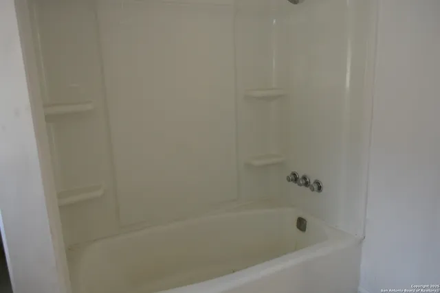 a bathroom with a bathtub