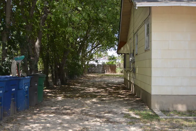 a fire hydrant in the middle of a field