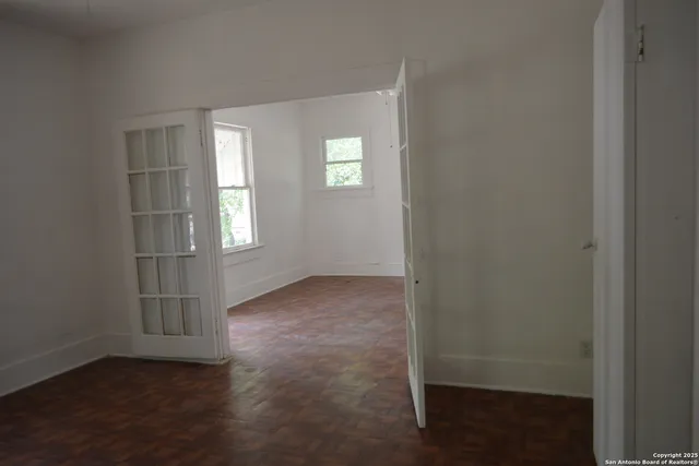 an empty room with windows