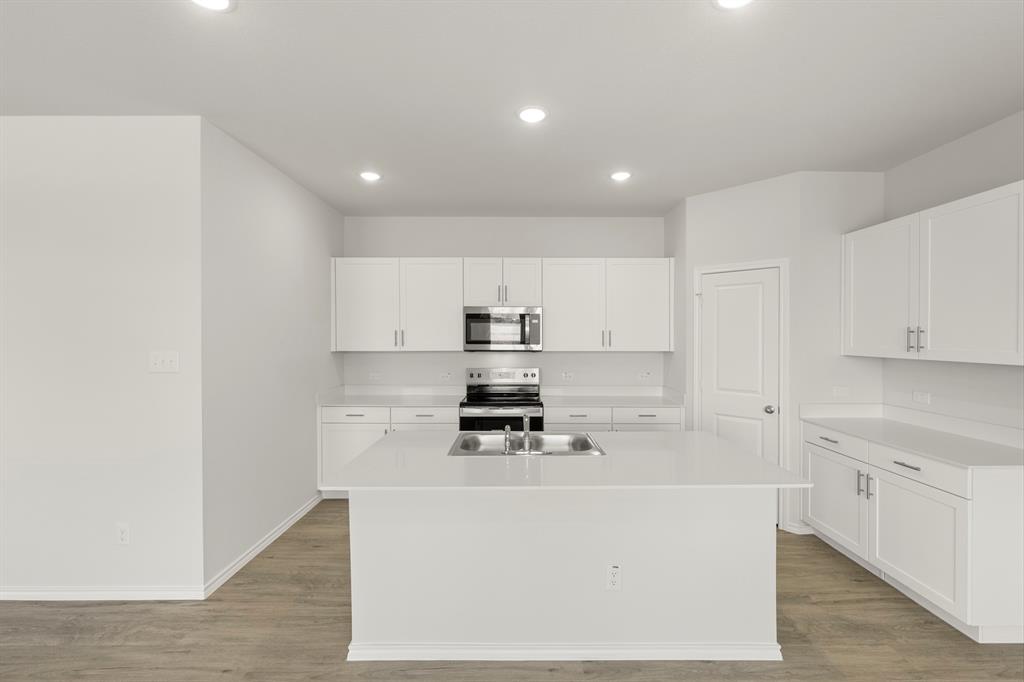 1715 Riverside Trail Blue Ridge, TX 75424 - Photo 5 of 27 08. 1715 Riverside - Kitchen