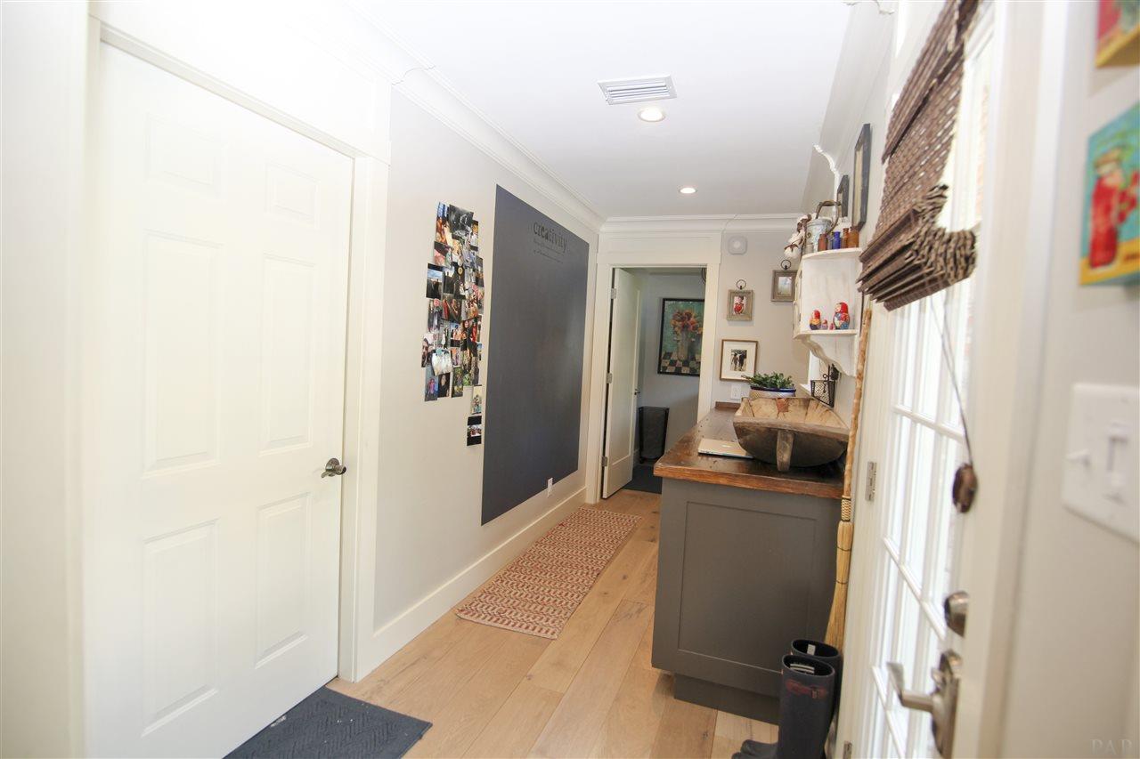 3535 Hopestill Road Pensacola, FL 32503 - Photo 9 of 29 Pantry cupboards right beside the kitchen!