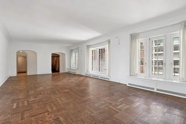 a view of a livingroom with wooden floor