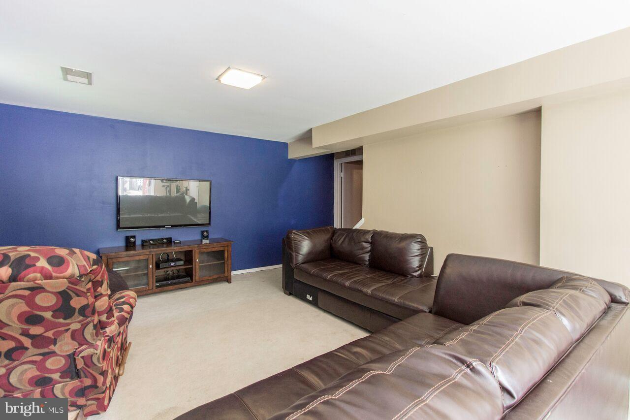 12728 Middlevale Lane Silver Spring, MD 20906 - Photo 16 of 22 TV room