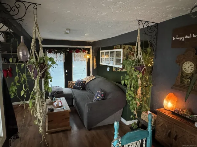 a kitchen with stainless steel appliances granite countertop a refrigerator and a stove