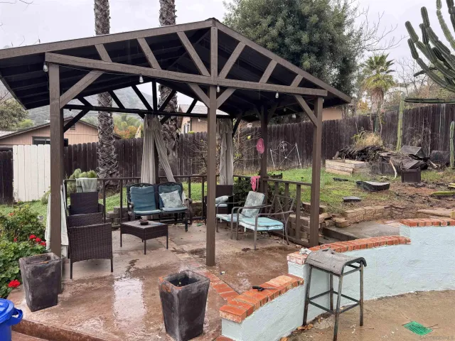 a house view with a backyard space