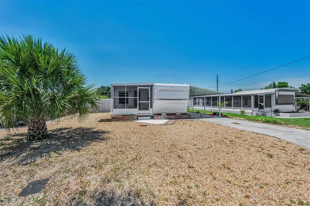 a house view with a backyard space