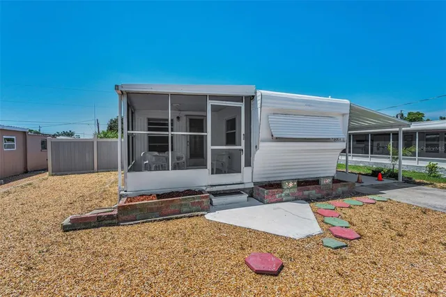 a house with swimming pool in front of it