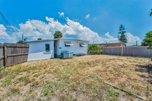a front view of house with yard
