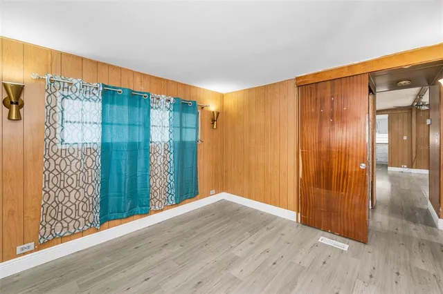 a view of entryway with wooden floor