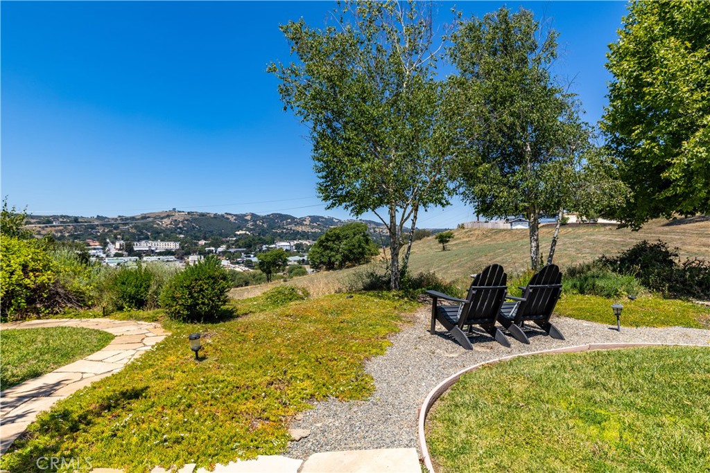 669 Red Cloud Road Paso Robles, CA 93446 - Photo 39 of 61 a view of a swimming pool with a lounge chair