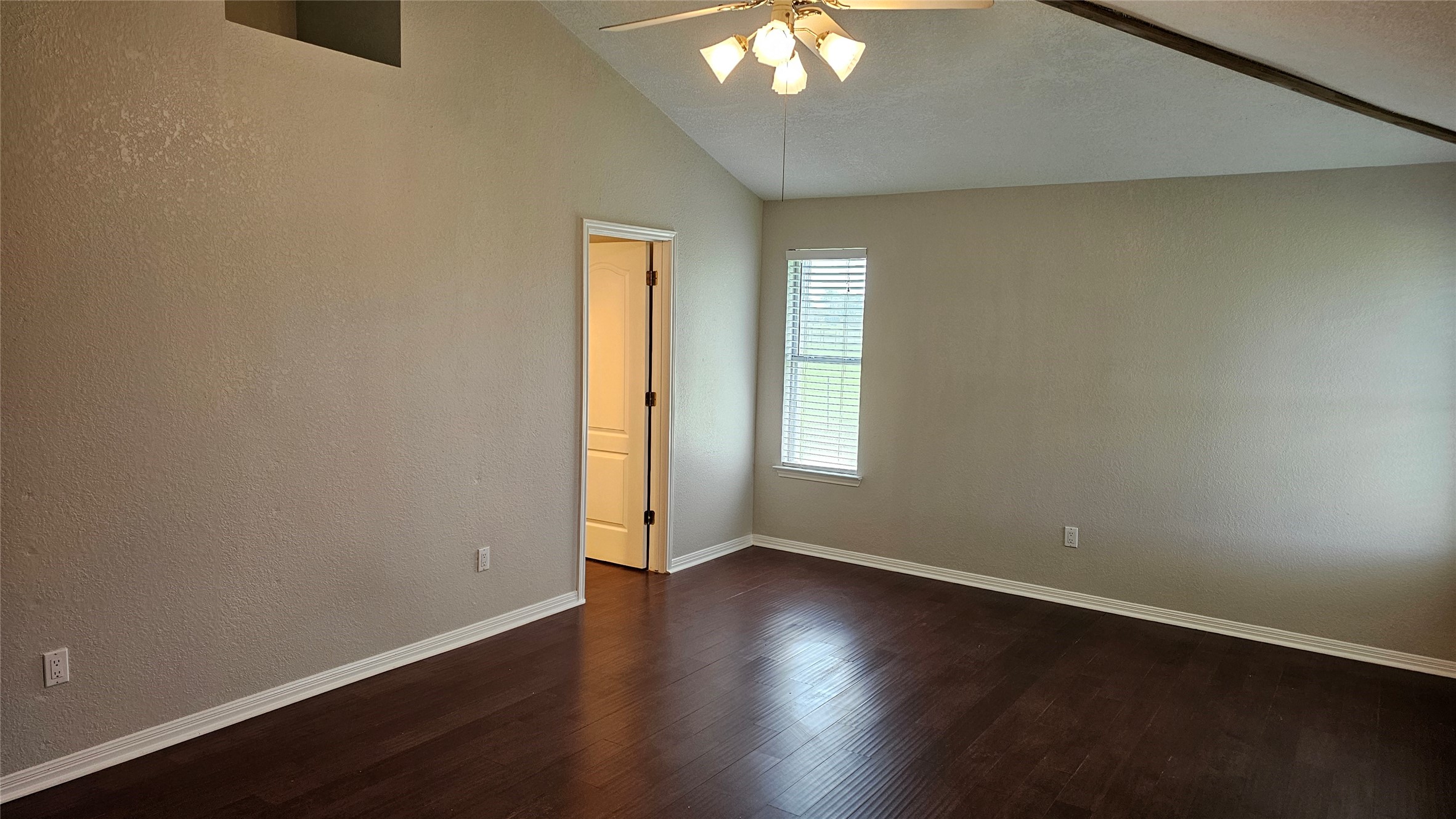 16 Brenda Lane Round Rock, TX 78665 - Photo 21 of 40 an empty room with wooden floor and windows