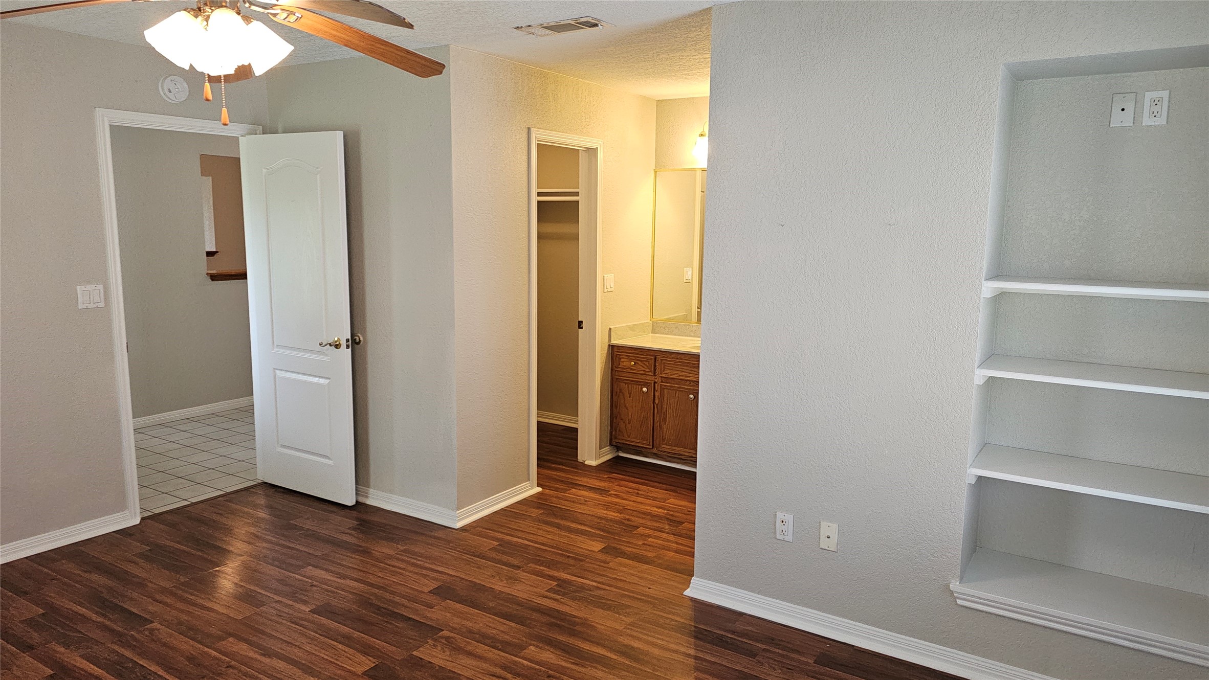 16 Brenda Lane Round Rock, TX 78665 - Photo 24 of 40 a view of an empty room with wooden floor and a window