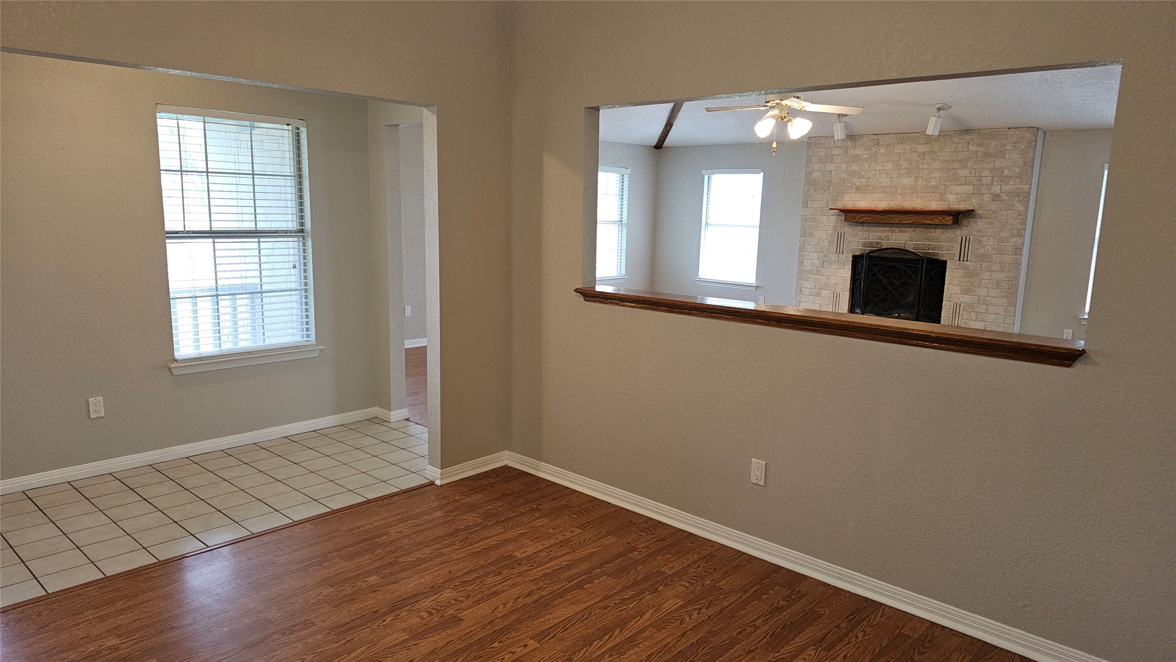 16 Brenda Lane Round Rock, TX 78665 - Photo 30 of 40 an empty room with wooden floor and a window