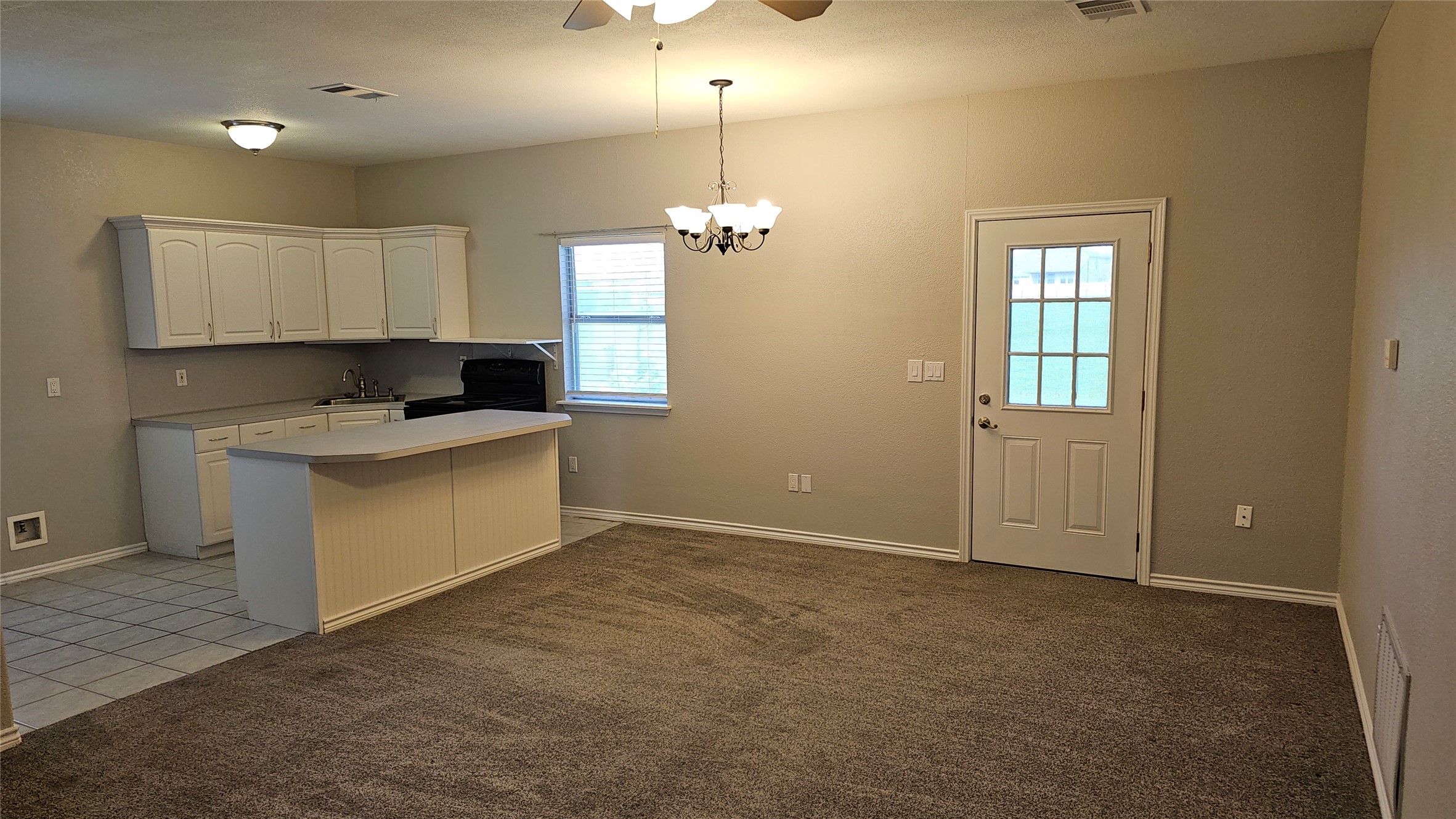 16 Brenda Lane Round Rock, TX 78665 - Photo 36 of 40 a kitchen that has a lot of cabinets and wooden floor