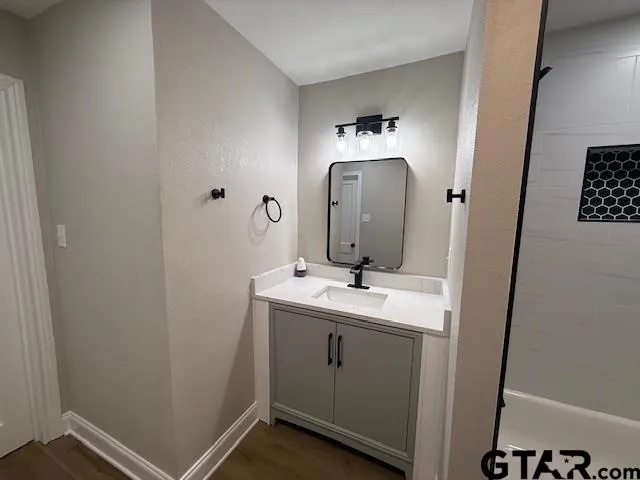 a white toilet sitting in a bathroom