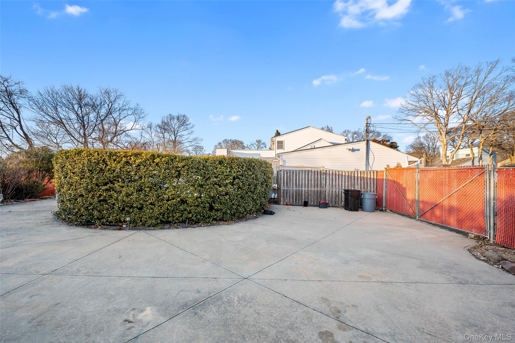 8 George Drive Mastic, NY 11950 - Photo 12 of 30 a view of a terrace with a bench