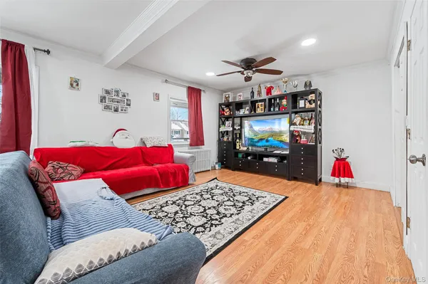 a living room with furniture rug and window