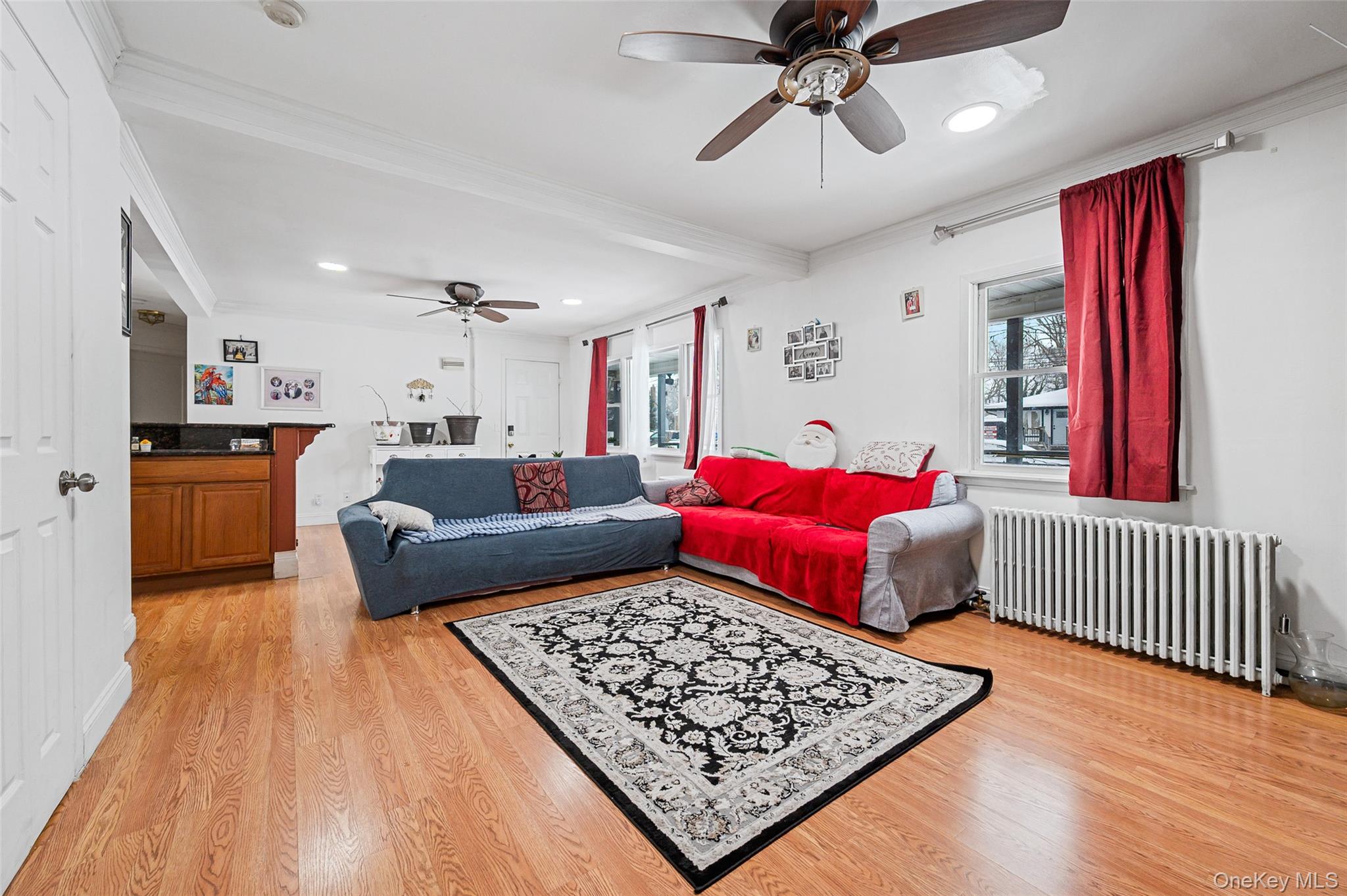 8 George Drive Mastic, NY 11950 - Photo 15 of 30 a living room with furniture rug and window