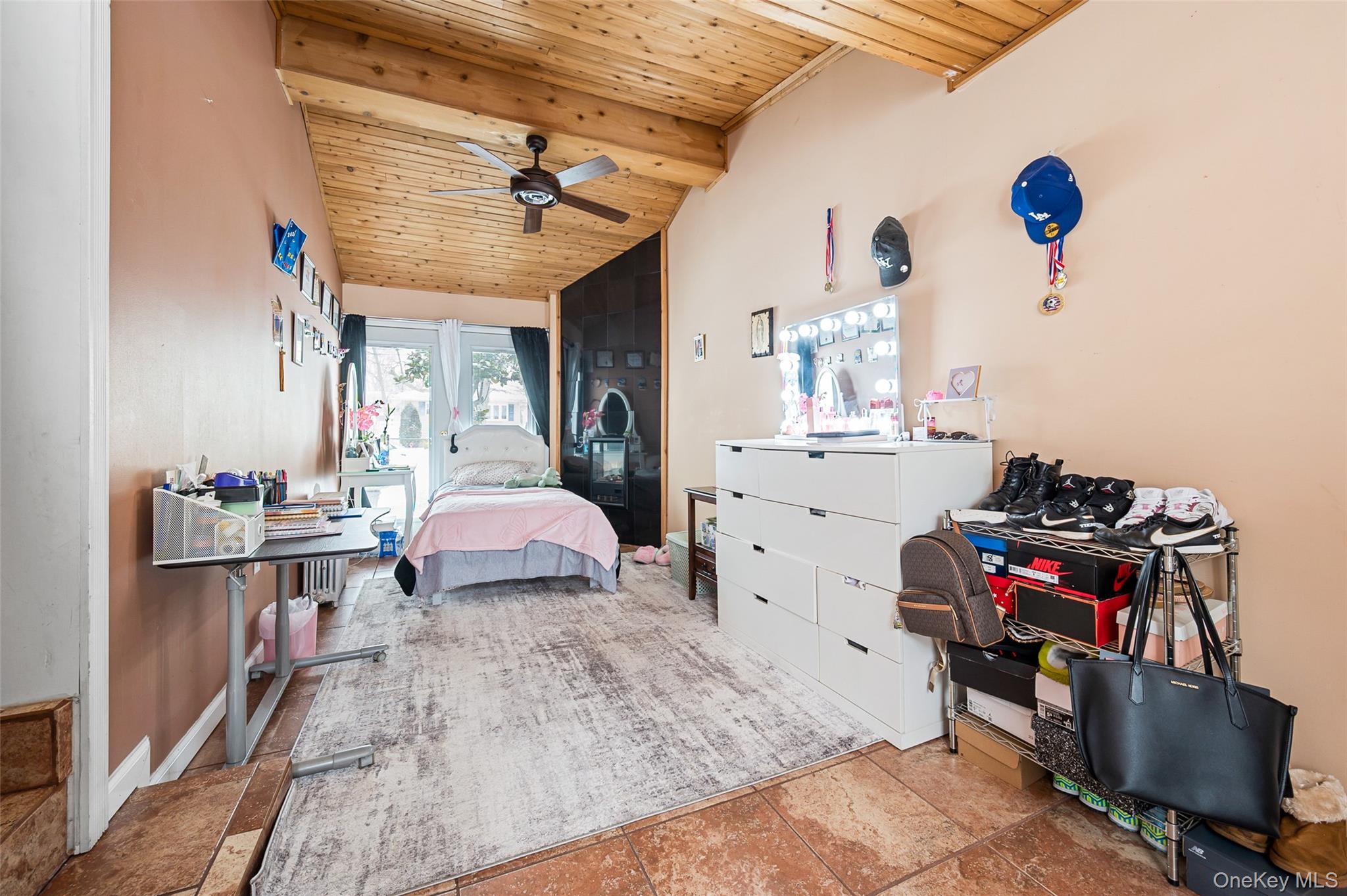8 George Drive Mastic, NY 11950 - Photo 20 of 30 a bedroom with a bed and wooden floor