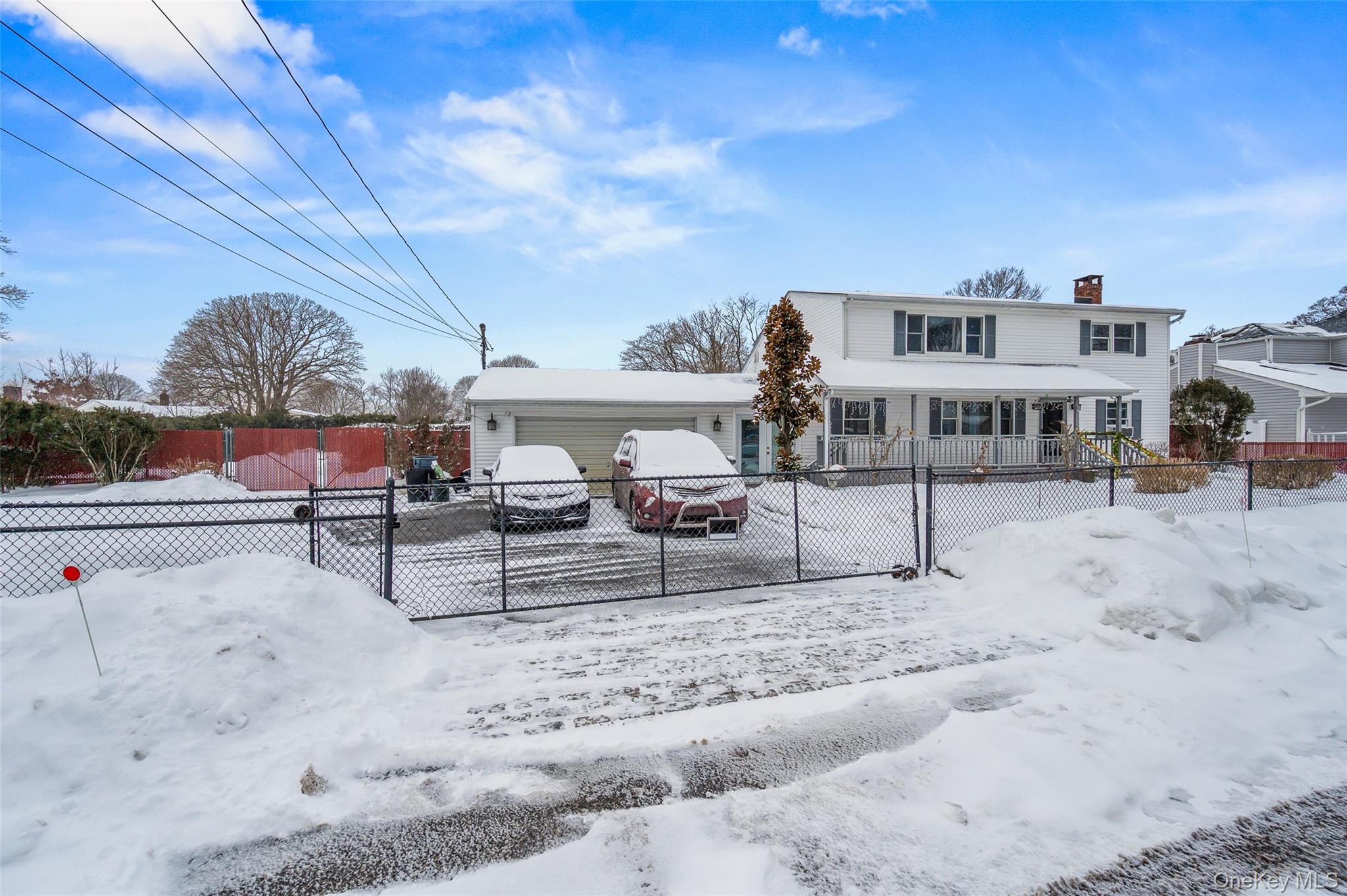 8 George Drive Mastic, NY 11950 - Photo 2 of 30 a view of a house with a park
