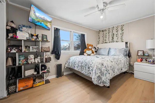 a bed room with a bed furniture and a window