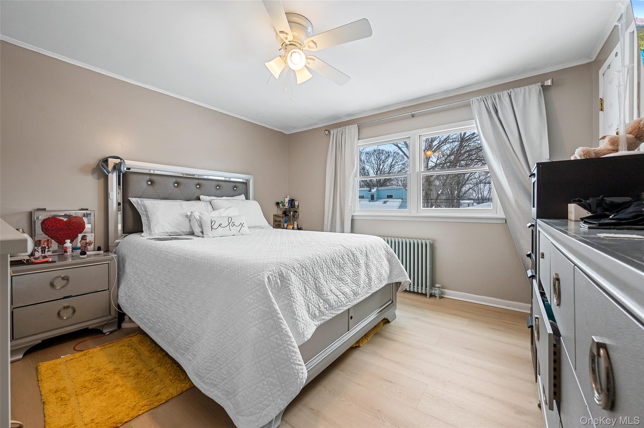 8 George Drive Mastic, NY 11950 - Photo 24 of 30 a bed room with a bed furniture and a window