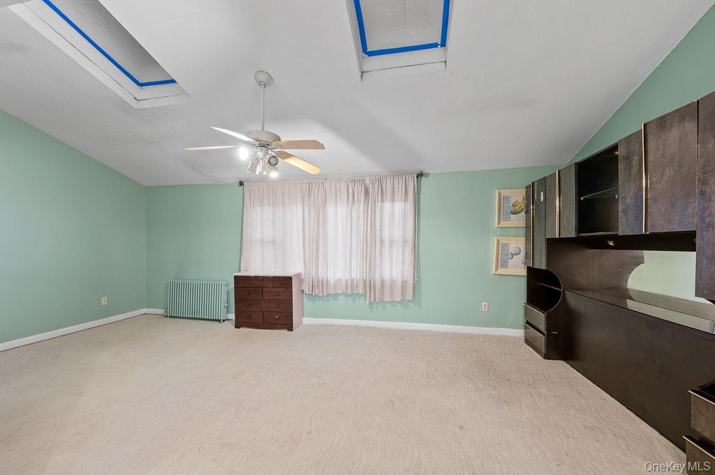 8 George Drive Mastic, NY 11950 - Photo 38 of 39 a workspace with furniture and window