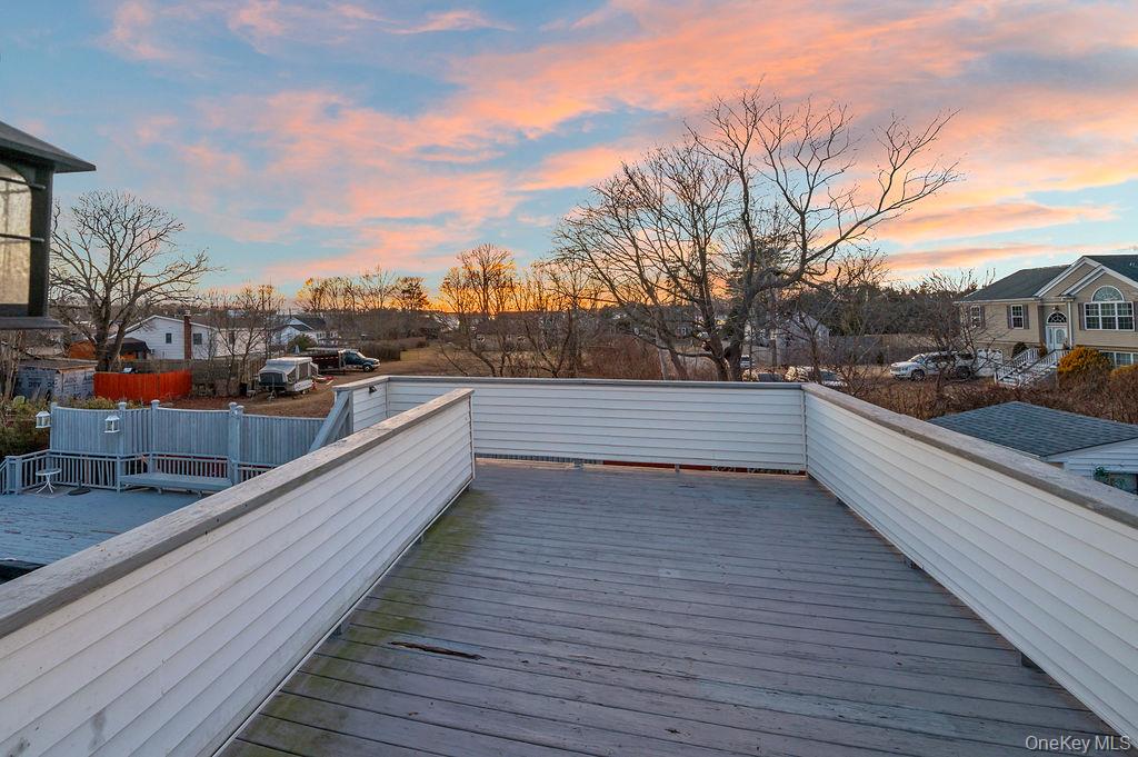 8 George Drive Mastic, NY 11950 - Photo 39 of 39 a view of balcony with furniture