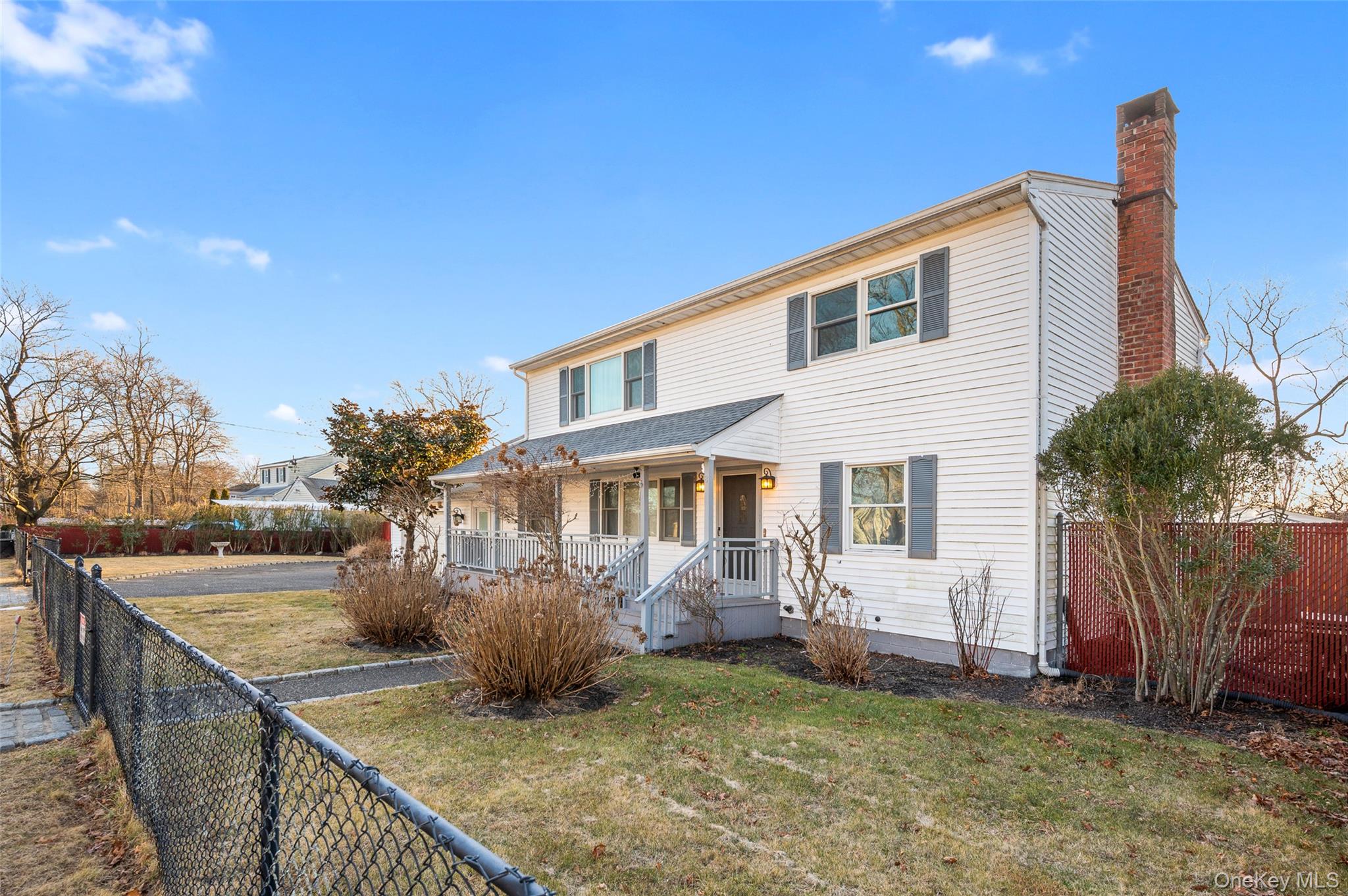 8 George Drive Mastic, NY 11950 - Photo 5 of 30 a view of a house with backyard and sitting area