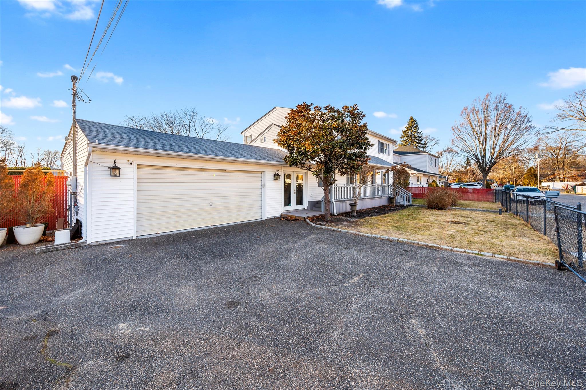 8 George Drive Mastic, NY 11950 - Photo 6 of 30 a view of a house with a yard
