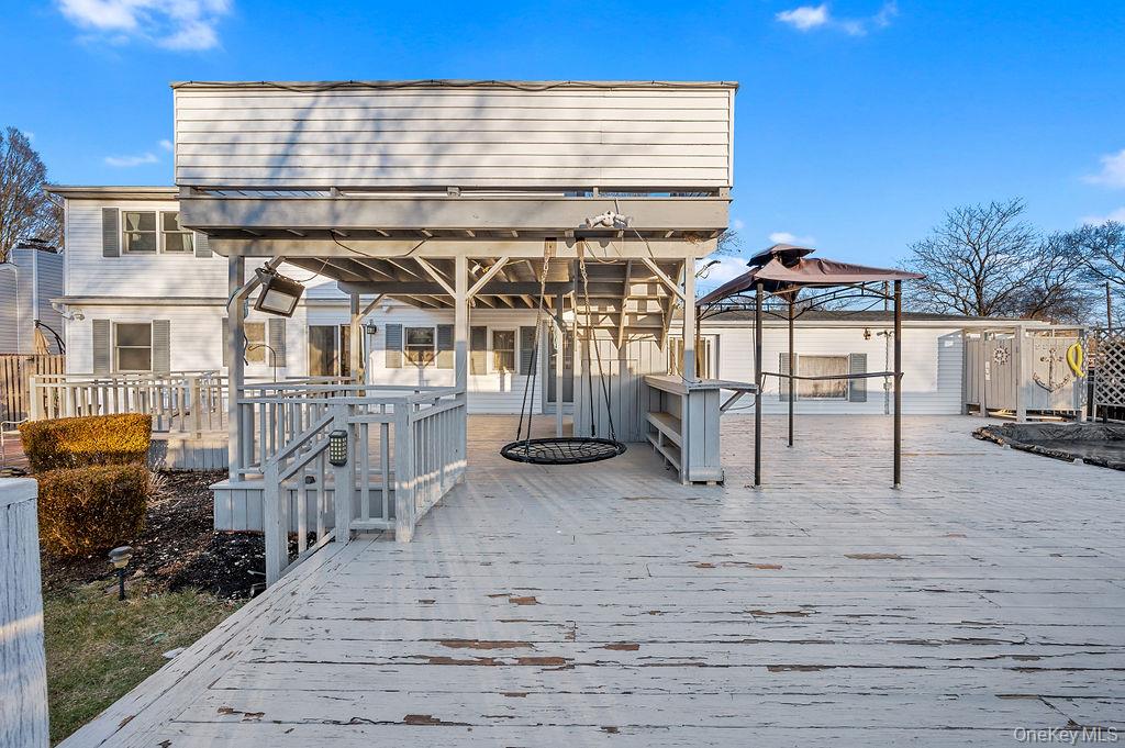 8 George Drive Mastic, NY 11950 - Photo 9 of 39 a view of a large building