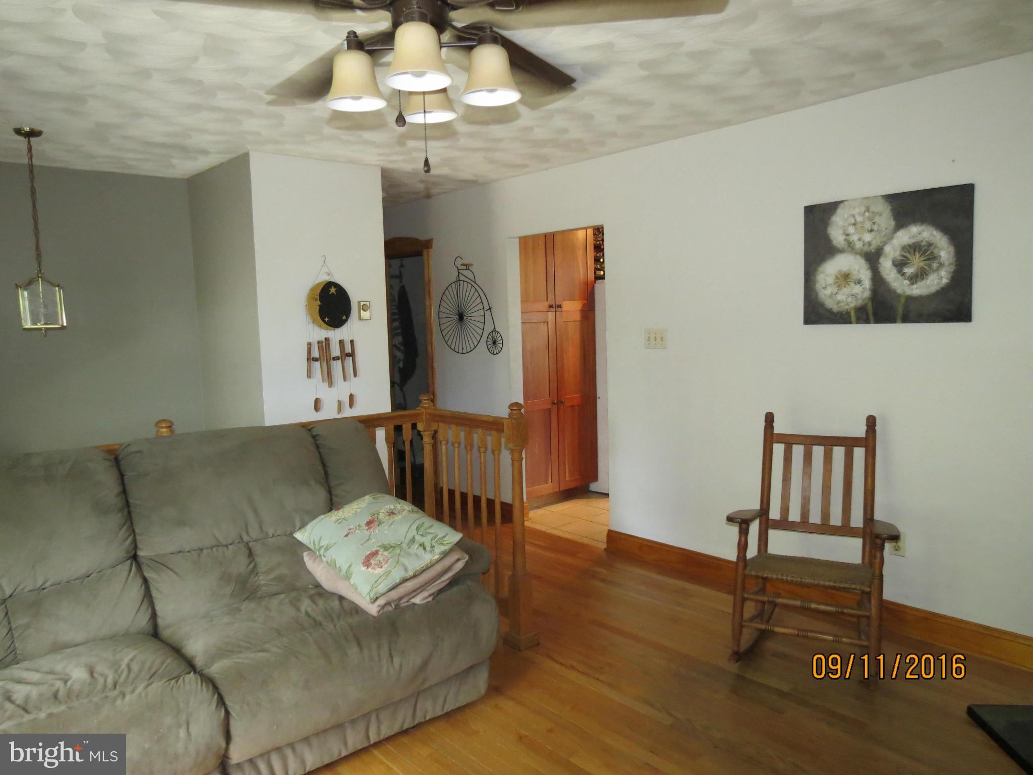 2017 Garrett Road Manchester, MD 21102 - Photo 11 of 30 Hardwood Floors and 6" Custom Trim