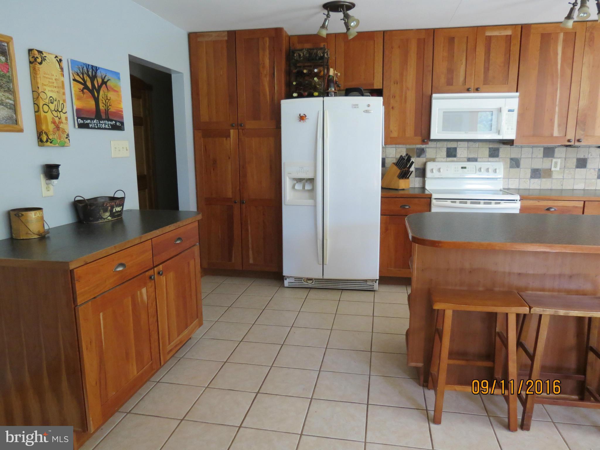 2017 Garrett Road Manchester, MD 21102 - Photo 4 of 30 Pantry, Sideboard and a Breakfast bar for Storage