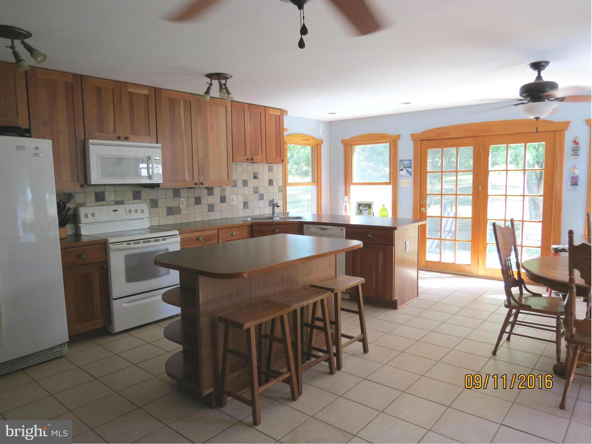2017 Garrett Road Manchester, MD 21102 - Photo 8 of 30 So many places to Sit in the Sunny Kitchen