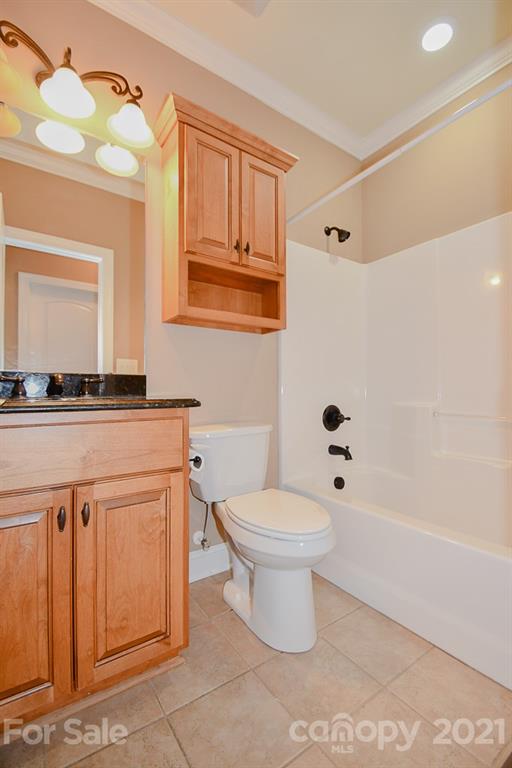 721 Roy Kindley Road Monroe, NC 28110 - Photo 16 of 32 a bathroom with a sink a toilet and shower
