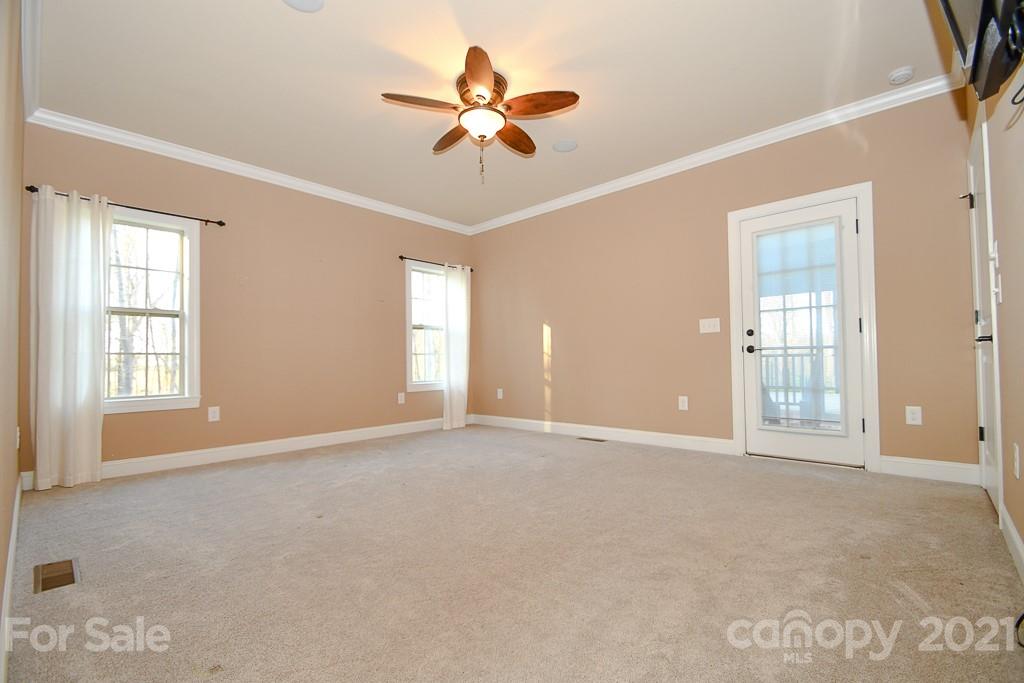 721 Roy Kindley Road Monroe, NC 28110 - Photo 21 of 32 a view of an empty room with a window