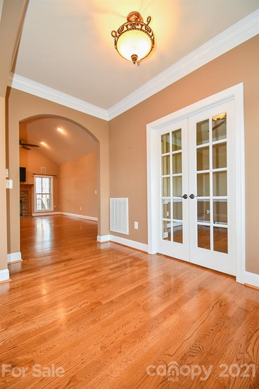 721 Roy Kindley Road Monroe, NC 28110 - Photo 8 of 32 a view of an empty room with a window