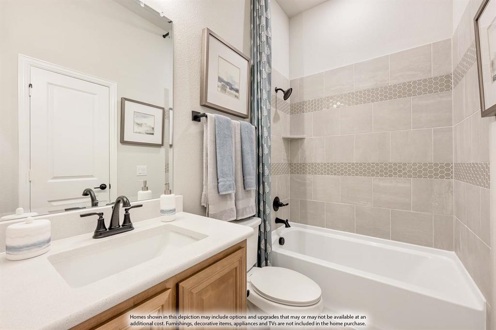 2206 Redding Drive Venus, TX 76084 - Photo 8 of 31 a bathroom with a sink a toilet and a bathtub