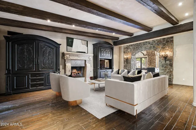 a kitchen with a stove and a wooden cabinets