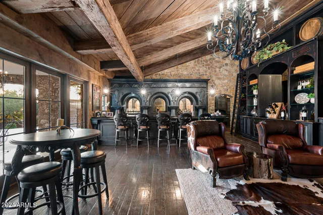 a view of a yard with plants and trees