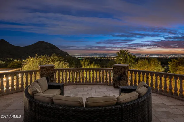 a bedroom with a bed and ceiling fan