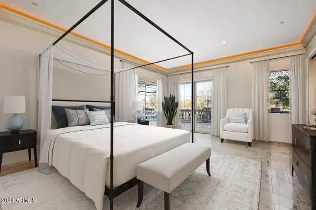 an outdoor space with lots of tables and chairs