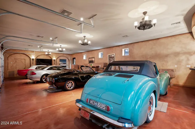 a view of a patio with dining table and chairs with wooden floor and fence