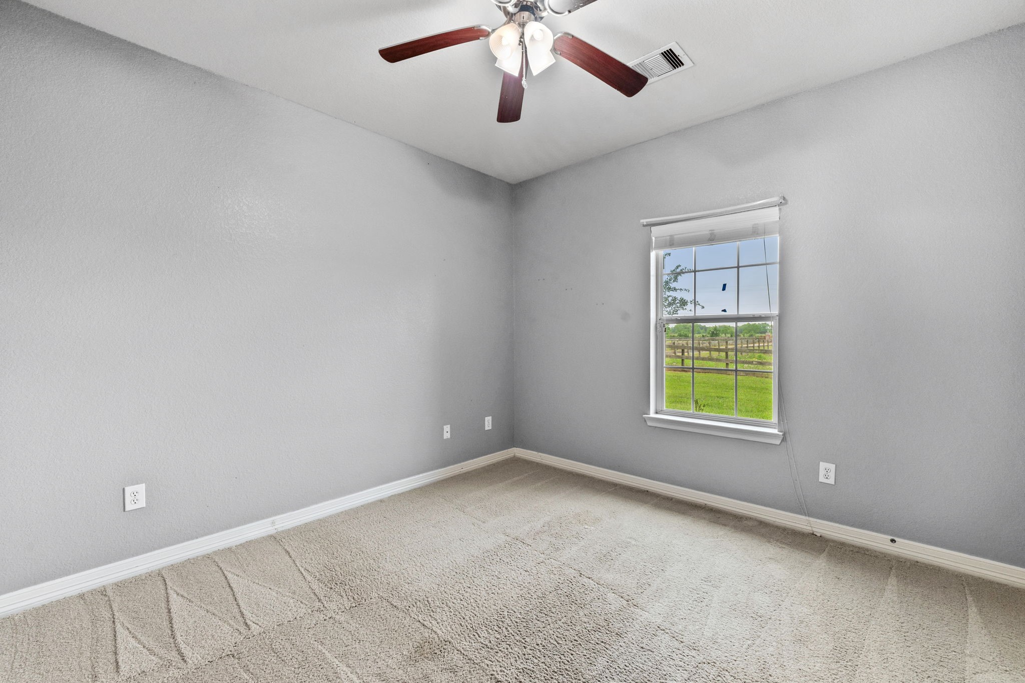 1405 Big Hill Road Winnie, TX 77665 - Photo 31 of 43 a view of an empty room with a window